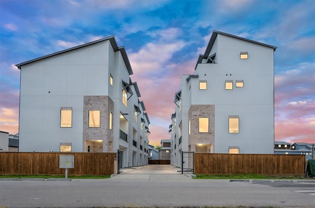 view of property exterior at dusk