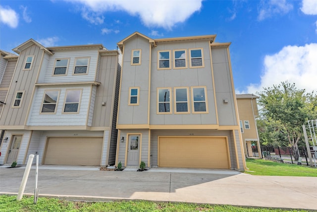 multi unit property featuring a garage