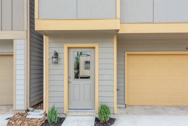 property entrance with a garage