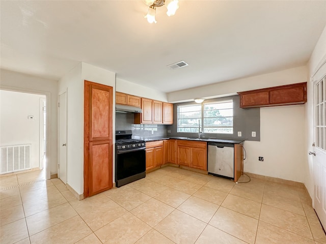 kitchen featuring black range with gas cooktop, light tile patterned floors, and dishwasher