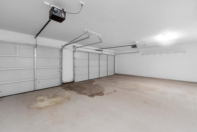 garage featuring a garage door opener