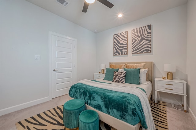 carpeted bedroom featuring ceiling fan