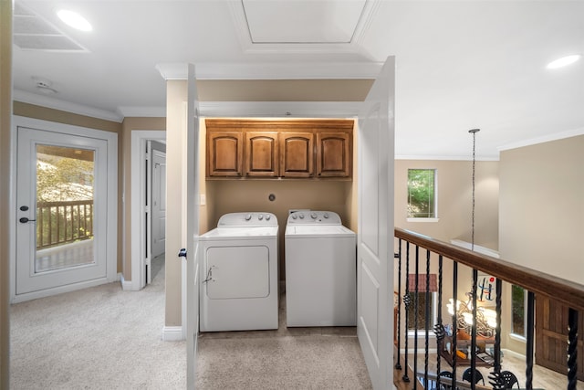 laundry area featuring a healthy amount of sunlight, cabinets, independent washer and dryer, and light carpet