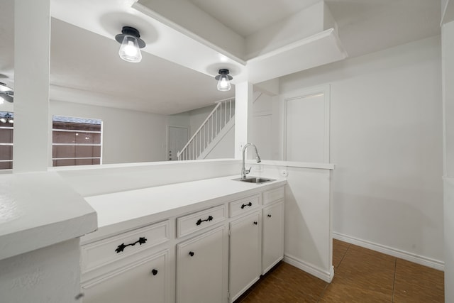 interior space with tile patterned flooring and sink