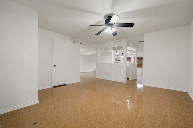 unfurnished living room featuring ceiling fan