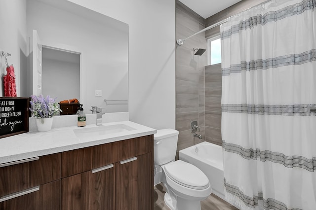 full bathroom featuring vanity, shower / bath combination with curtain, toilet, and wood-type flooring