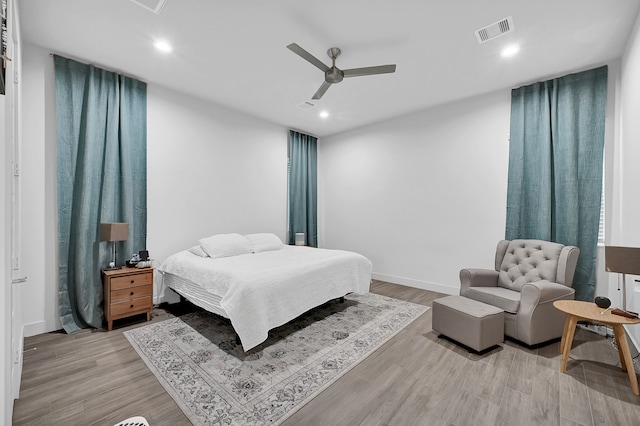 bedroom featuring ceiling fan and light wood-type flooring