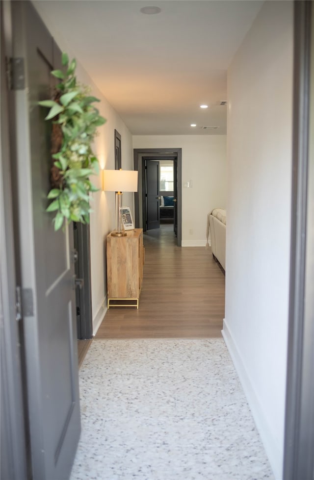 hall featuring wood-type flooring