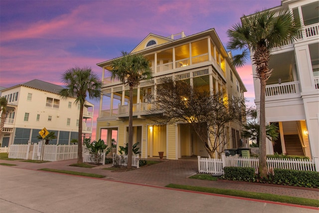 view of front of property with a balcony