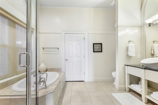 full bathroom featuring separate shower and tub, tile patterned flooring, vanity, and toilet