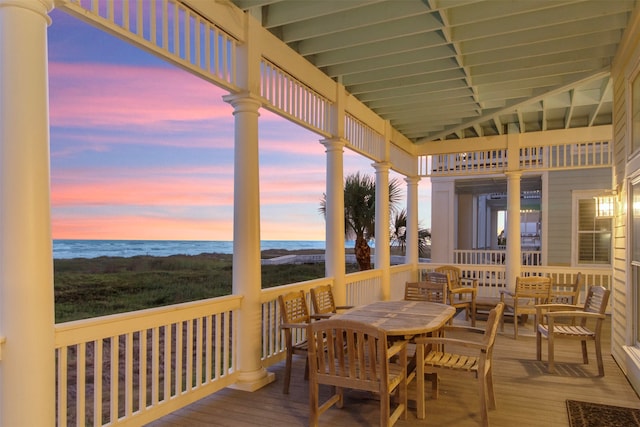 deck at dusk with a water view