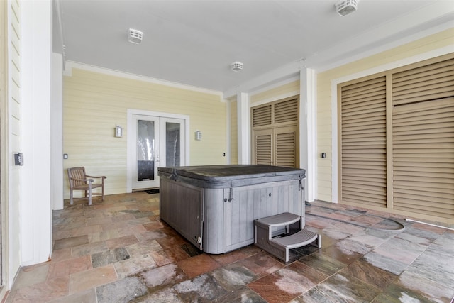 view of patio / terrace with a hot tub