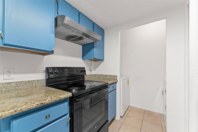 kitchen featuring light stone counters, light tile patterned flooring, blue cabinets, black range with electric stovetop, and wall chimney exhaust hood