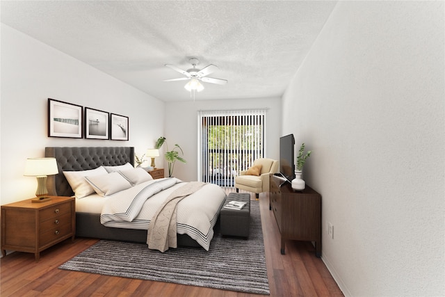 bedroom with access to exterior, a textured ceiling, dark wood-type flooring, and ceiling fan