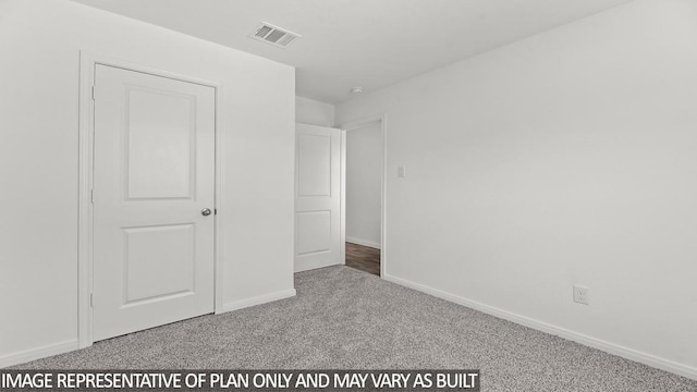 unfurnished bedroom featuring carpet flooring