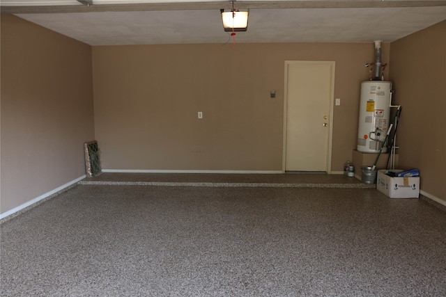 garage with gas water heater and a garage door opener