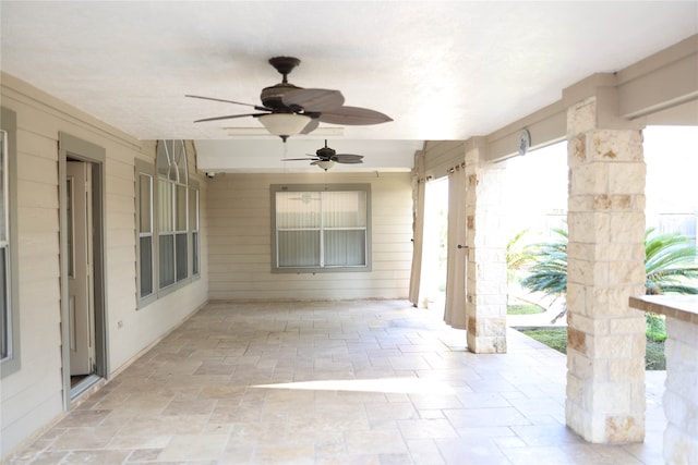 view of patio / terrace featuring ceiling fan