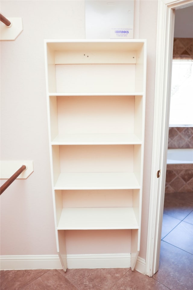 walk in closet featuring tile patterned floors