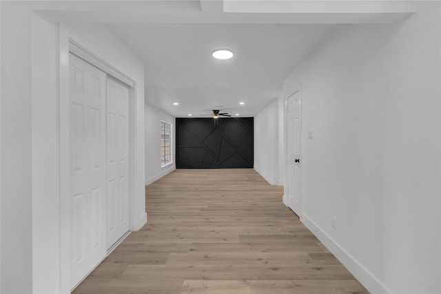 corridor featuring light hardwood / wood-style flooring