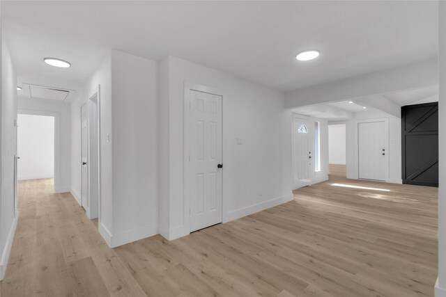 hall featuring light hardwood / wood-style floors