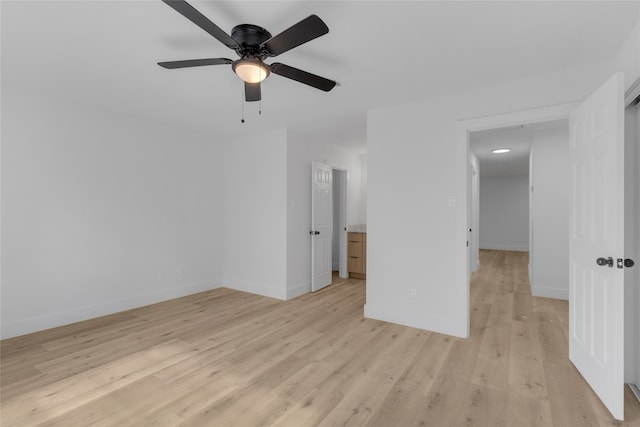 interior space with ceiling fan and light hardwood / wood-style flooring