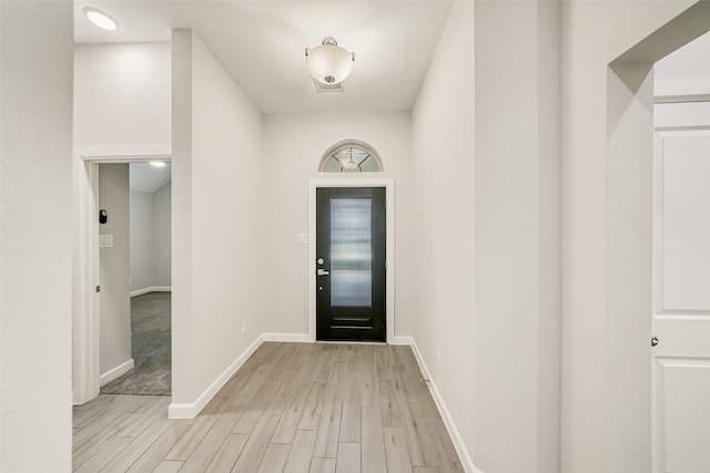 entrance foyer featuring light hardwood / wood-style floors