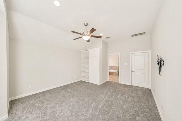 unfurnished bedroom with ceiling fan and carpet flooring