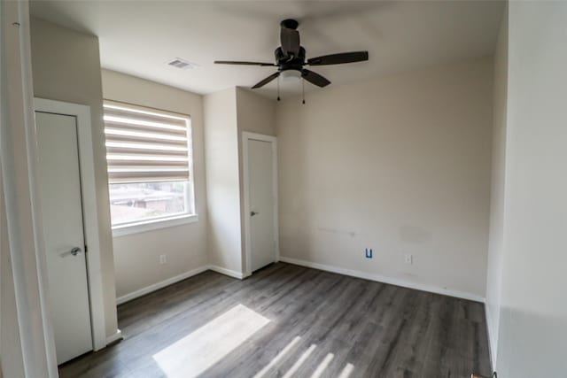 unfurnished bedroom with hardwood / wood-style flooring and ceiling fan