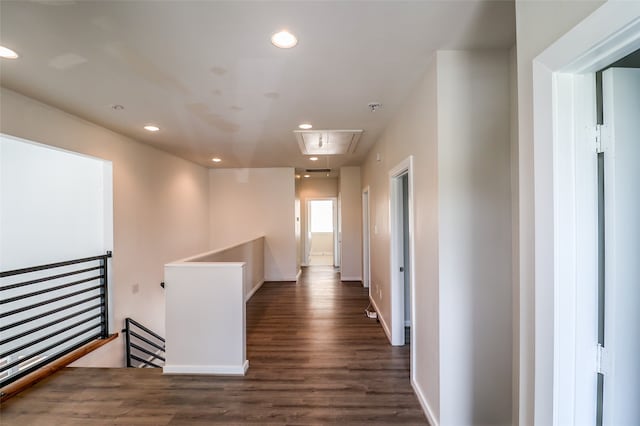 corridor featuring dark hardwood / wood-style floors