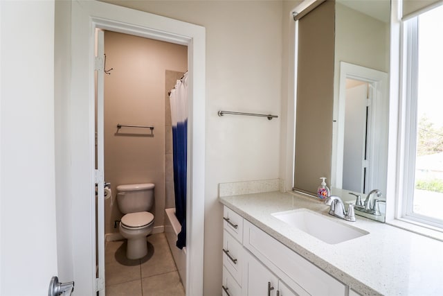 bathroom featuring tile patterned floors, vanity, toilet, and a shower with shower curtain