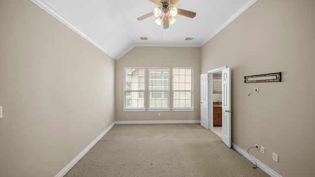 unfurnished bedroom with ceiling fan, lofted ceiling, crown molding, and light carpet