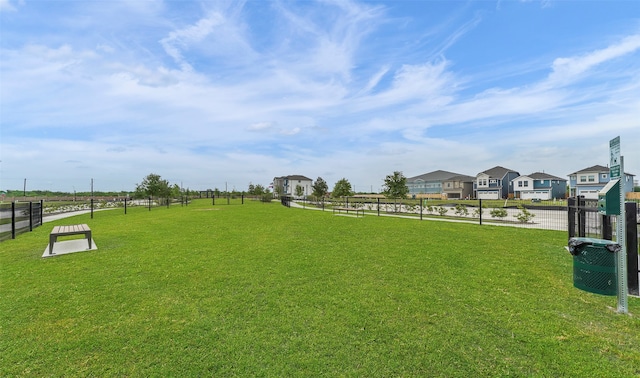 view of community with a yard