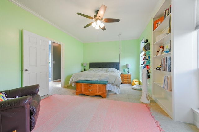 bedroom with ceiling fan, light tile patterned floors, and ornamental molding