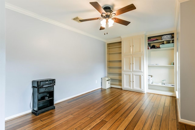 bedroom featuring wood-type flooring, ceiling fan, and ornamental molding