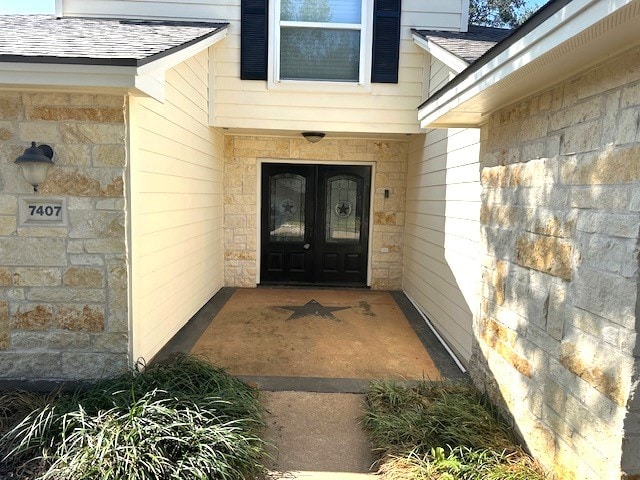 doorway to property with french doors