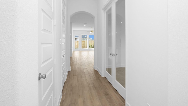 corridor featuring light hardwood / wood-style flooring