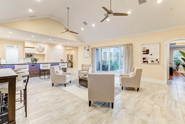 living room with high vaulted ceiling, a wealth of natural light, and crown molding