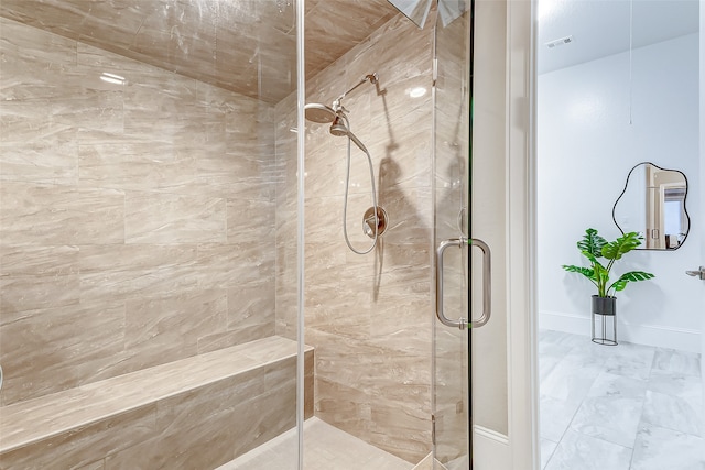 bathroom with an enclosed shower