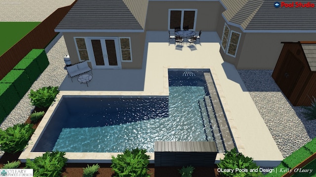 view of pool with a patio and french doors