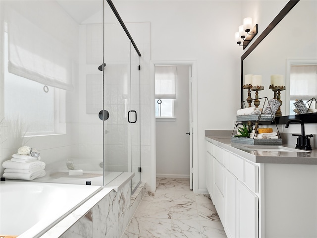 bathroom with separate shower and tub and vanity