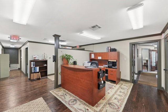 home office with dark hardwood / wood-style floors and crown molding