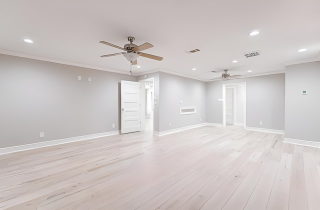 spare room with light wood-style floors, recessed lighting, visible vents, and crown molding