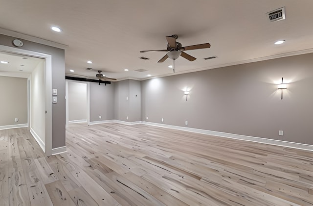 spare room with a ceiling fan, recessed lighting, visible vents, and light wood-style floors