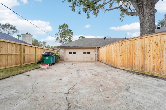 exterior space with a garage