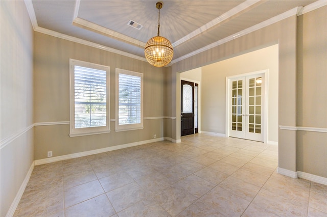 empty room featuring a tray ceiling, french doors, light tile patterned floors, and a notable chandelier