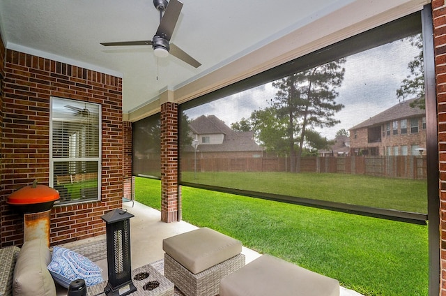 view of patio featuring ceiling fan