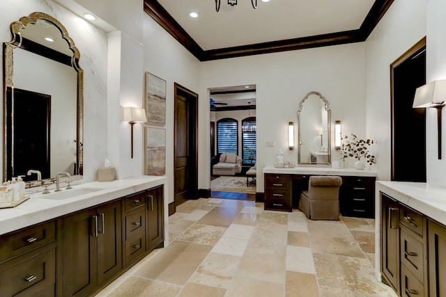 bathroom with vanity and crown molding