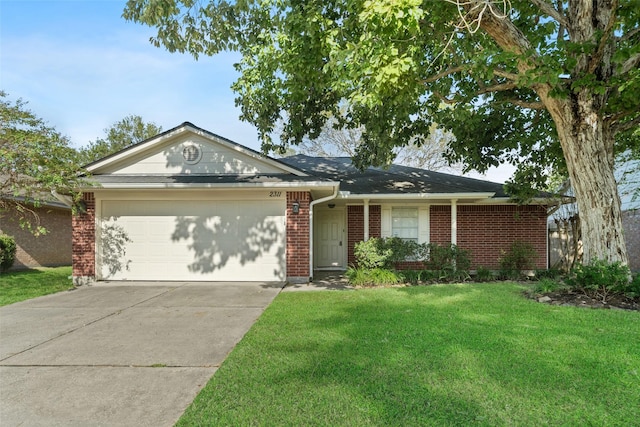 ranch-style home featuring a front lawn and a garage