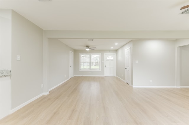 unfurnished living room with light hardwood / wood-style floors and ceiling fan