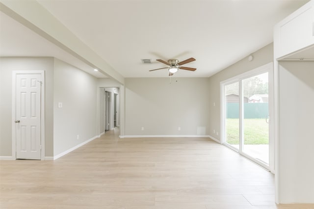 unfurnished room featuring ceiling fan and light hardwood / wood-style flooring